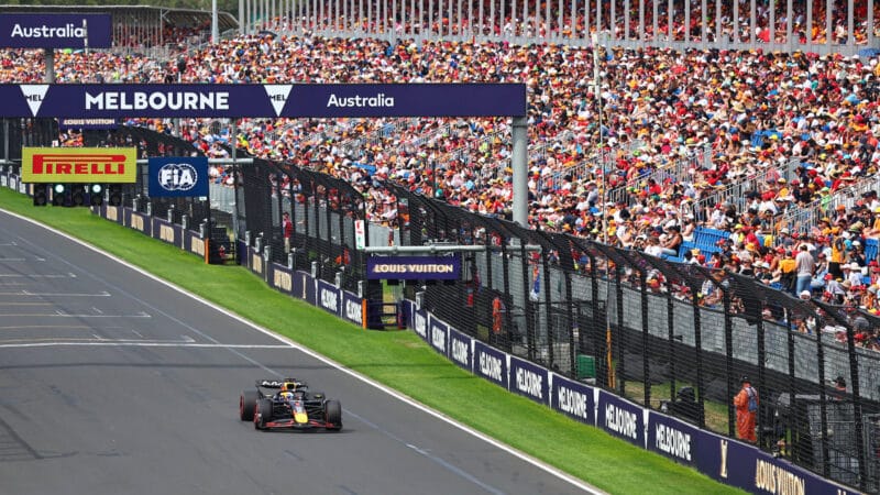 Max Verstappen (Red Bull-Honda) and full grandstands during practice for the 2025 Australian Grand Prix