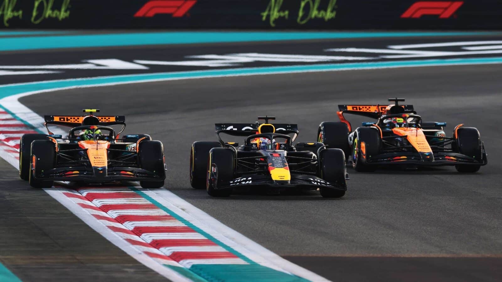 Lando Norris, Max Verstappen and Oscar Piastri battle on track