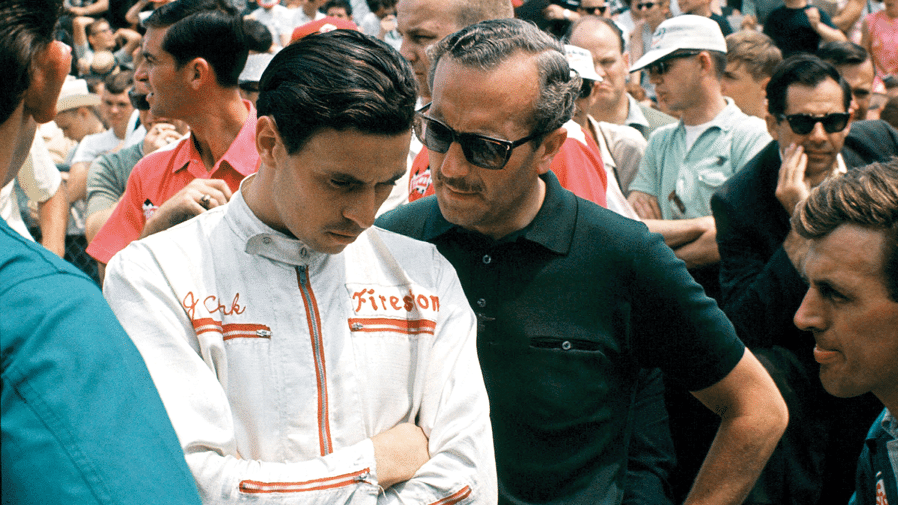 Pensive conversation between Jim Clark and Colin Chapman ahead of the start. Jimmy qualified on the front row, second to AJ Foyt – but only because the 1964 winner screwed himself up to beat Clark’s new record mark of 160.729mph. Foyt, in a Lotus 34, pulled out a speed of 161.233mph, 7mph up on his 1964 best in a front-engined Watson